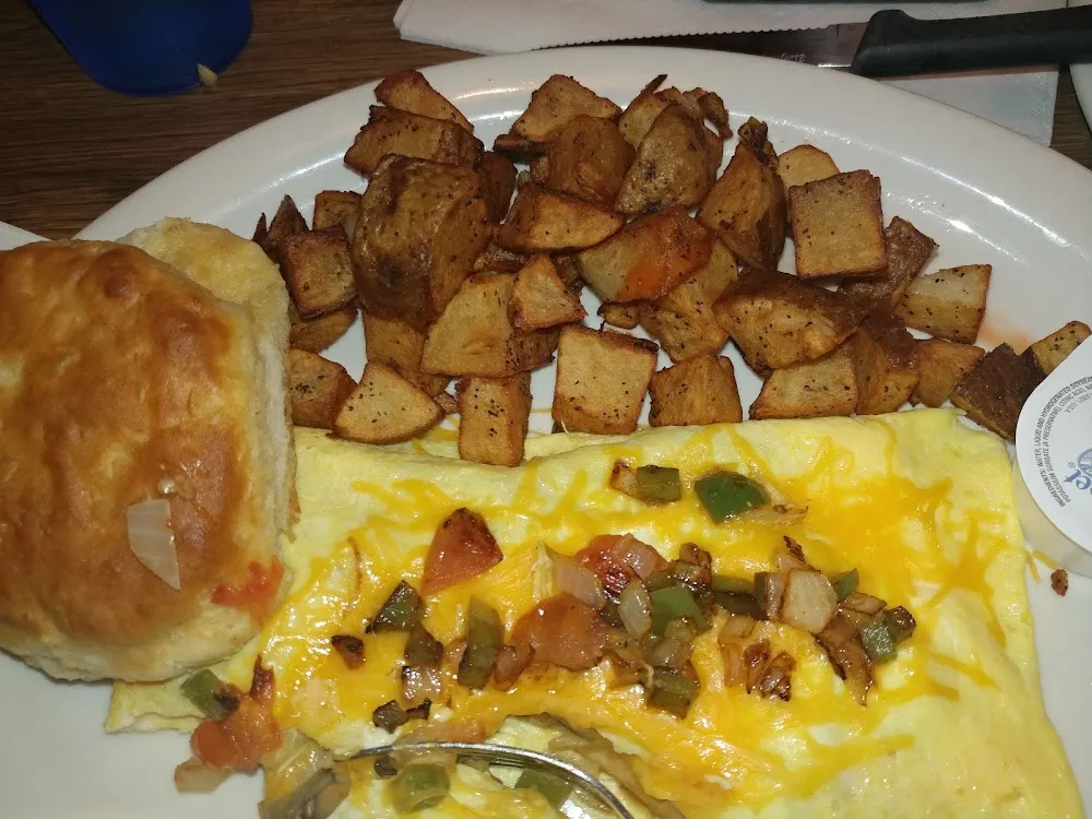 Veggie Omelette with Hash Browns and Biscuit